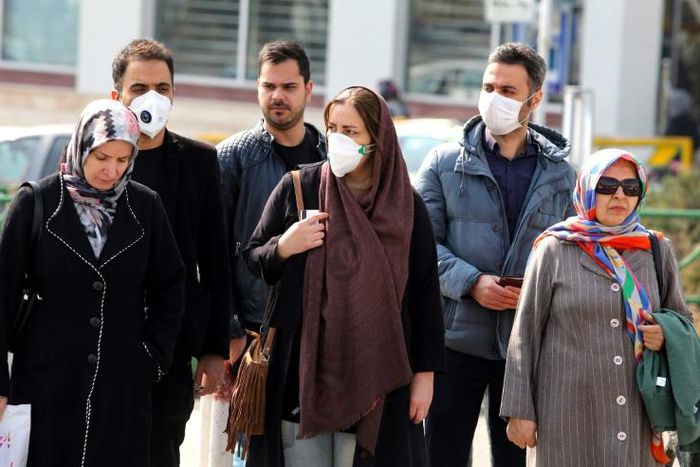 Some Iranians have begun wearing face masks amid a deadly coronavirus outbreak