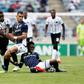Lorenzo Gordinho (C) and Thabang Monare (R) of Bidvest Wits thwart Siphesihle Ndlovu of Orlando Pirates (L)