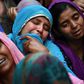 Relatives of Mohammad Mudasir, 31, who died in the sectarian riots in India's captial over Prime Minister Narendra Modi's citizenship law, mourn during his funeral in New Delhi