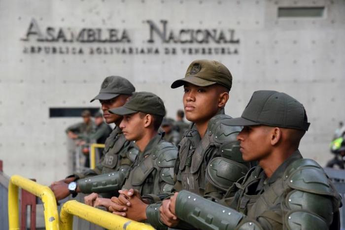 Members of Venezuela's National Guard man a barricade outside of the National Assembly in Caracas on January 5, 2020, a move opposition leader Juan Guaido denounced as 'unprecedented'
