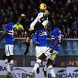 Juventus Portuguese forward Cristiano Ronaldo jumps above Sampdoria's Italian defender Nicola Murru to score a header during the Serie A match