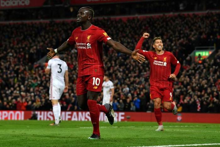 Liverpool's Sadio Mane celebrates after finishing off Sheffield United