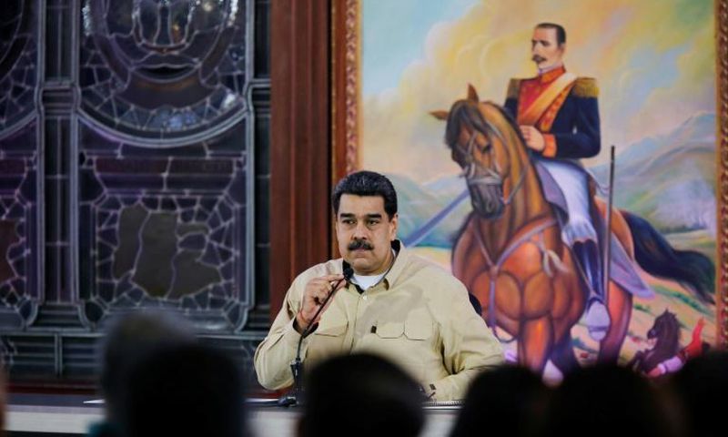 The United States claims the government of Venezuelan President Nicolas Maduro, shown here in a handout photo, is getting rich through drug trafficking
