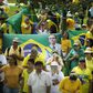 Supporters of the Brazilian President Jair Bolsonaro take part in a protest against the National Congress and the Supreme Court while wearing protective face masks to prevent the spread of the new Coronavirus, COVID-19, in Brasilia, on March 15, 2020