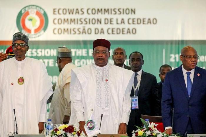 L-R: Nigeria President Muhammadu Buhari, Chairman, ECOWAS, Mahamadou Issoufou, and President of Ecowas Commission, Jean-Claude Kassi Brou attend the fifty-sixth ordinary session of the Economic Community of West African States in Abuja