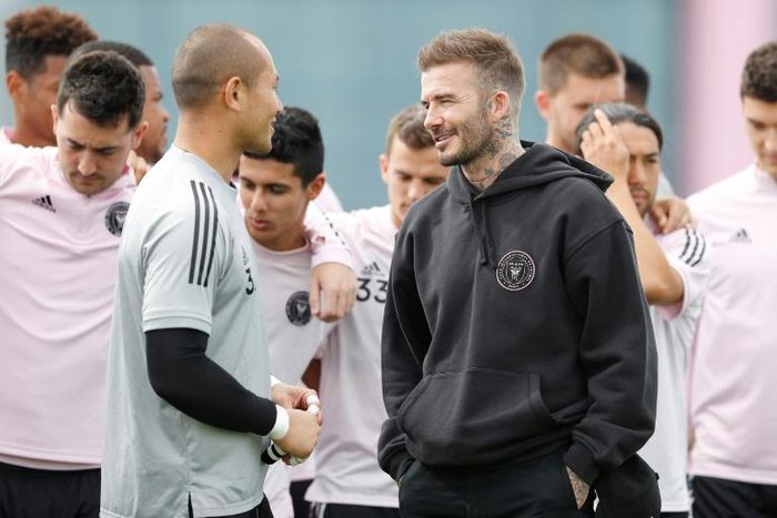 Inter Miami co-owner and president of soccer operations David Beckham talks with members of the team's squad