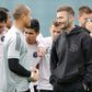 Inter Miami co-owner and president of soccer operations David Beckham talks with members of the team's squad
