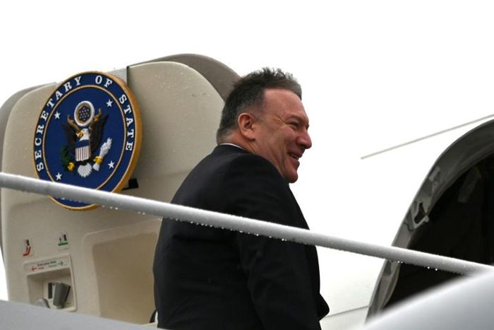 US Secretary of State Mike Pompeo boards his plane at Andrews Air Force Base en route to Munich on a trip that will include his first tour of sub-Saharan Africa
