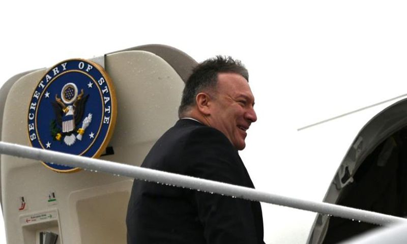 US Secretary of State Mike Pompeo boards his plane at Andrews Air Force Base en route to Munich on a trip that will include his first tour of sub-Saharan Africa