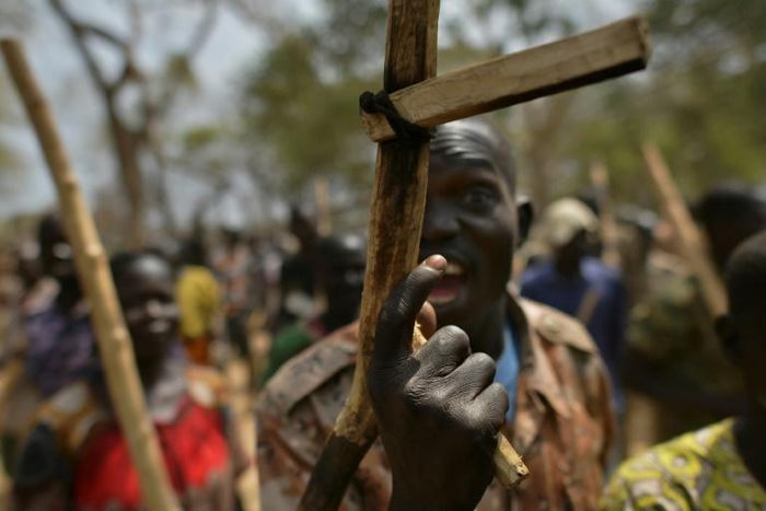 A soldier gestures with his wooden rifle at a UN-run programme to reconcile government troops with their former rebel enemies -- a key component of South Sudan's peace process