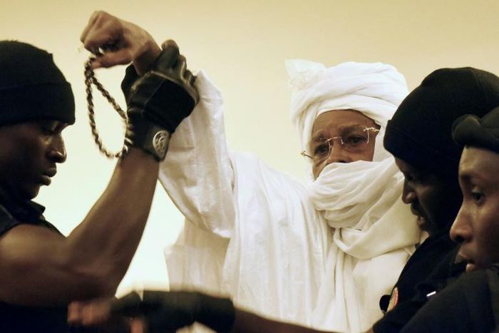 Former Chadian dictator Hissene Habre (C, pictured being escorted to court in 2015) has been granted two months' leave from prison as his jail is being used for new detainees in coronavirus quarantine