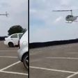 Parents use helicopter to deliver books to student on campus after he forgot them at home