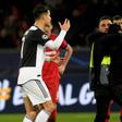 Close call: Cristiano Ronaldo berates a pitch invader who wanted a selfie with the Juventus star