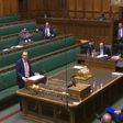 Britain's Health Secretary Matt Hancock makes a statement in parliament with social distancing measures in place