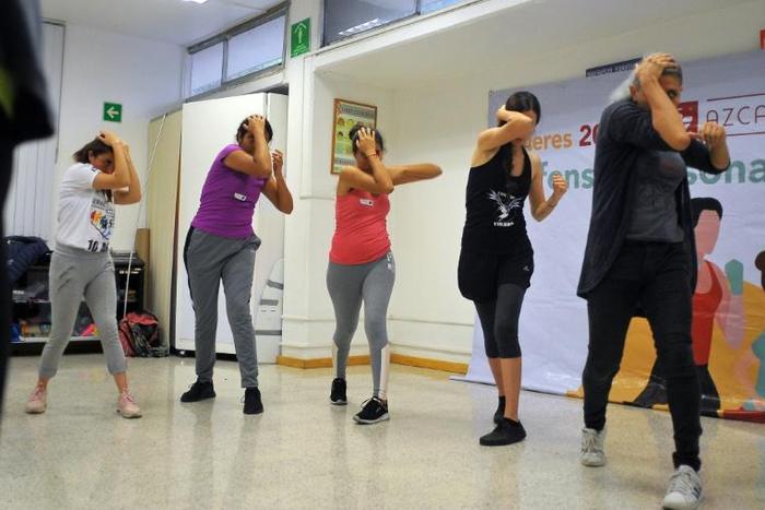 A group of young women attend a self-defense class in Mexico City's Azcapotzalco neighborhood -- the government offers the training to help combat the country's epidemic of violence against women
