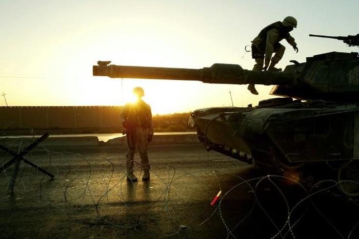 American troops invaded Iraq in 2003, left in 2011, and returned at the invitation of the Iraq government in 2014 to help fight against the Islamic State group
