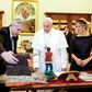 Francis and Fernandez, seen exchanging gifts, focused on social issues but most notably Argentina's debt woes ahead of a Vatican seminar on debt restructuring