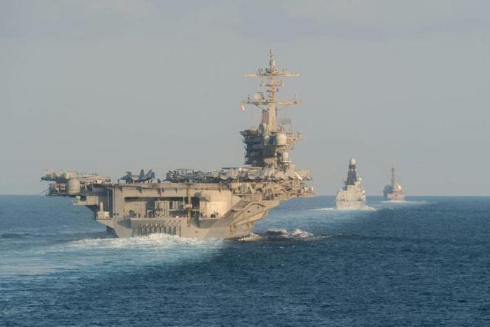 The aircraft carrier USS Abraham Lincoln and its strike group travelled through the Strait of Hormuz this week, a first for a US carrier since April