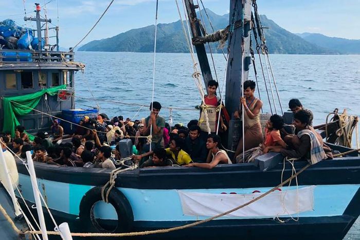 Malaysian authorities have arrested two people suspected of being human traffickers in connection with the arrival of this boat crammed with Rohingya migrants in Langkawi on April 5
