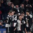 Paulo Dybala (C) celebrates with Cristiano Ronaldo (R) after scoring the winning goal.