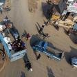 Syrian families flee the village of Hazano, about 20 kilometres northwest of the city of Idlib, towards the Turkish border on Sunday, after the regime stepped up advances against jihadists