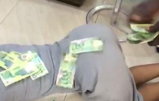 Nana Aba's baby daddy Osebo sprays cash on Akuapem Poloo as she twerks