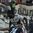 Adebayor (top) made his Olimpia debut on Sunday