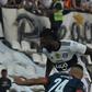 Adebayor (top) made his Olimpia debut on Sunday