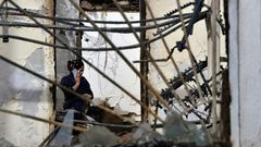 Hundreds of ethnic Kazakh assailants descended on the mainly Dungan village of Masanchi, setting fire to dozens of shops, homes and livestock