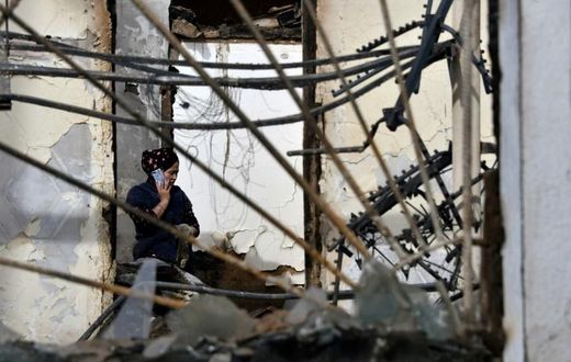 Hundreds of ethnic Kazakh assailants descended on the mainly Dungan village of Masanchi, setting fire to dozens of shops, homes and livestock