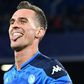 Napoli's Polish forward Arkadiusz Milik celebrates after scoring his second goal during the UEFA Champions League Group E football match Napoli vs Genk on December 10, 2019 at the San Paolo stadium in Naples.