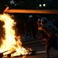 A demonstrator takes part in a protest against the government in Santiago, Chile on November 14, 2019