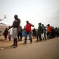 People at the border between Abuja and Nasarawa state waited to have their temperature checked