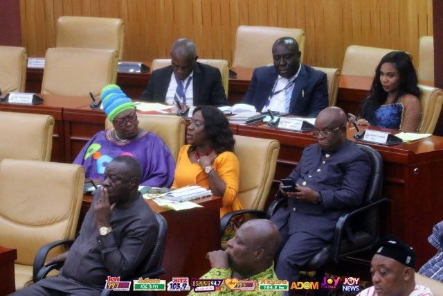 Catherine Afeku in yellow dress