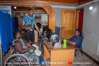 Police officer registers physically challenged onto NHIS