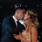 Uruguayan Barcelona forward Luis Suarez and wife Sofia Balbi kiss as before renewing their vows