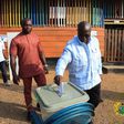 Photos show President Akufo Addo and his wife Rebecca voting at Kyebi