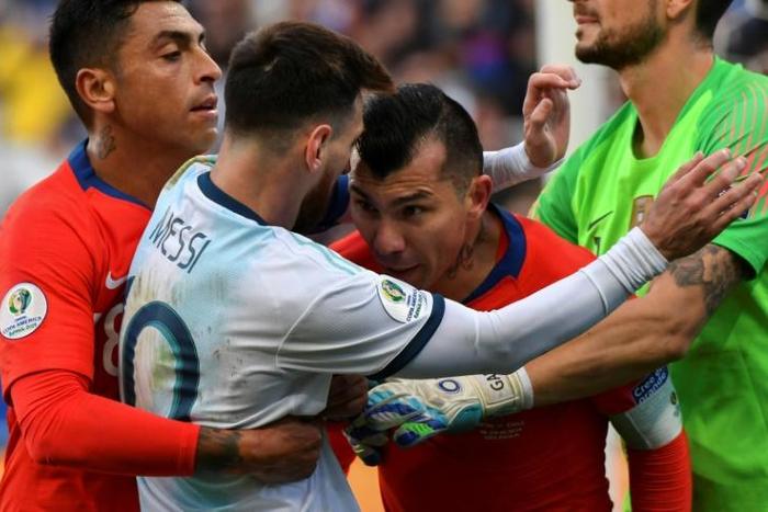 International team captain Gary Medel (second right) says Chile has more important issues to contend with than playing football matches after weeks of crisis
