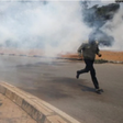 Kenyan police enforcing lock-down take to their heels as residents chase them up with teargas