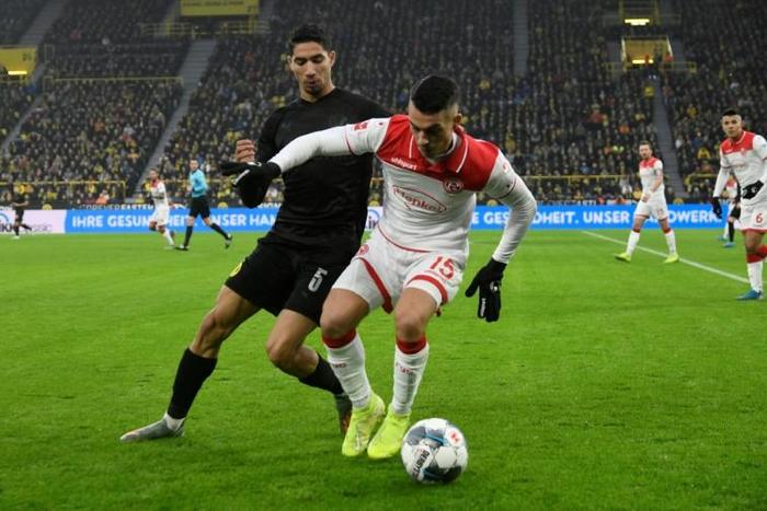 Fortuna Duesseldorf midfielder Erik Thommy (R) sealed his team's 2-1 win at home to Union Berlin
