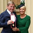 Kenny Dalglish with his wife Marina after being knighted in 2018