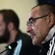 Juventus coach Maurizio Sarri (R) and forward Gonzalo Higuain speak during a press conference in Turin.