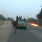 Dangerous roads: A screen grab from a January 2018 video released by Boko Haram, showing jihadists attacking the military on a highway near Maiduguri