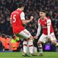 Sokratis Papastathopoulos (left) celebrates Arsenal's second goal against Manchester United