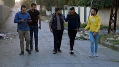 Young men in Iraq's second city Mosul ahead of performing a local adaption of famous Italian resistance song 'Bella Ciao'