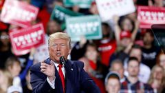 US President Donald Trump ticked off his list of enemies as he addressed supporters in Michigan