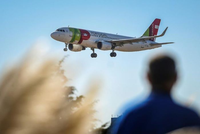 A plane of Portuguese TAP airline prepares to land at Humberto Delgado airport in Lisbon in October 2018