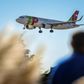 A plane of Portuguese TAP airline prepares to land at Humberto Delgado airport in Lisbon in October 2018