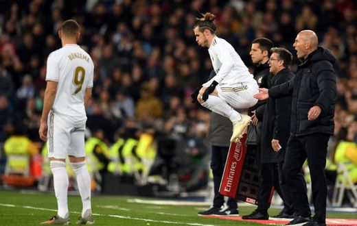 Gareth Bale (right) was whistled by Real Madrid's fans when he came on in the 3-1 win over Real Sociedad on Saturday