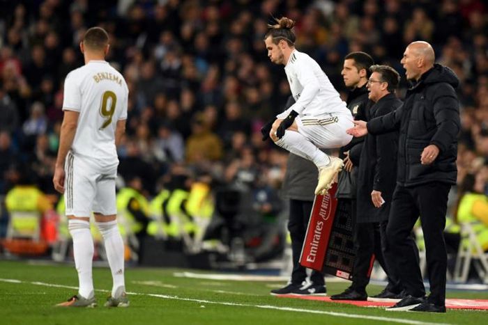 Gareth Bale (right) was whistled by Real Madrid's fans when he came on in the 3-1 win over Real Sociedad on Saturday
